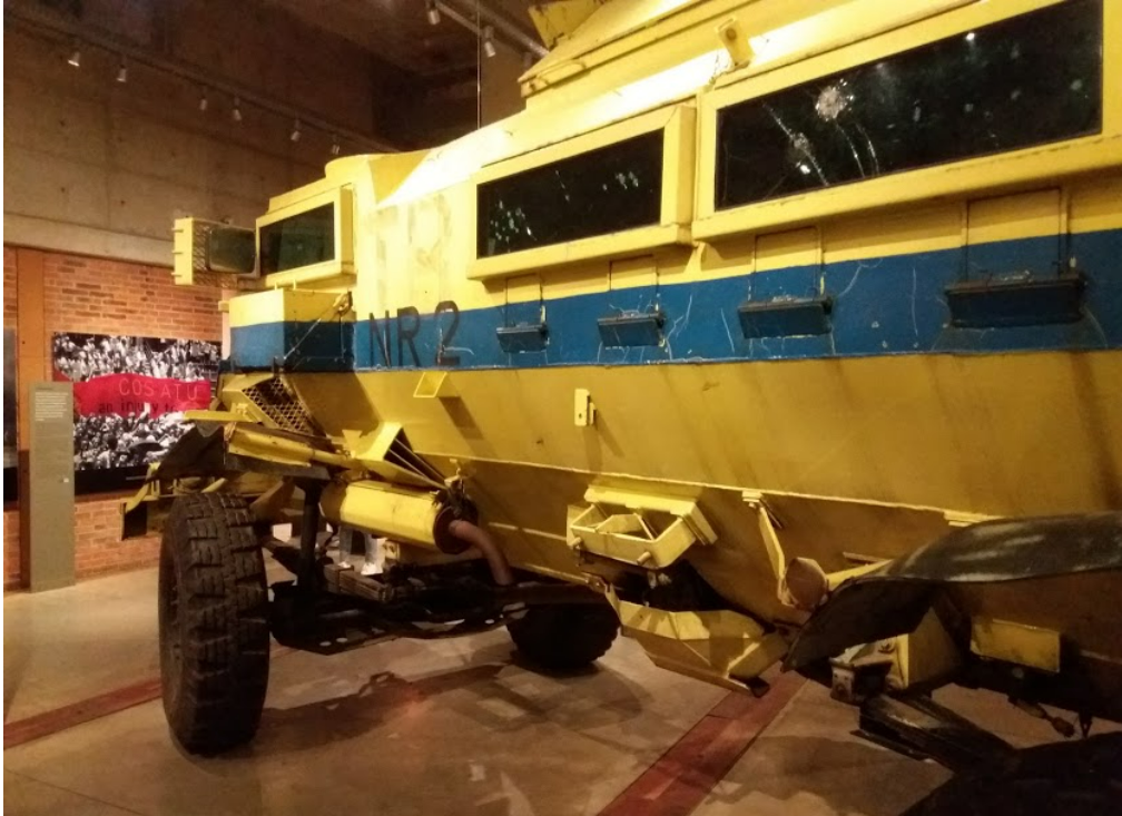 A yellow army vehicle known as a casspir in the apartheid museum