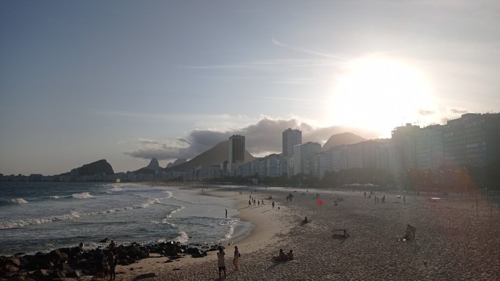 The sun setting over Copacabana beach