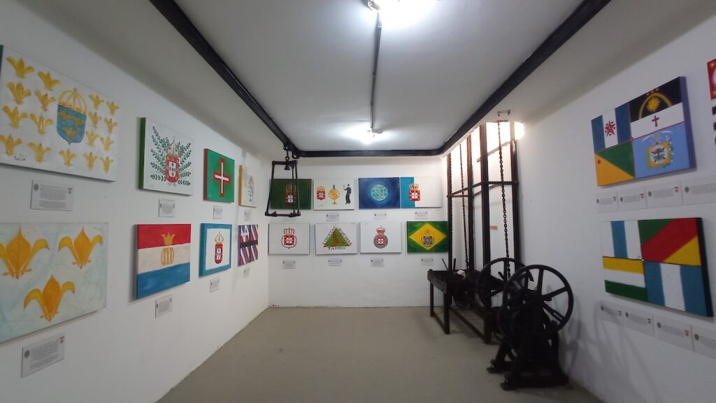 A series of historic Brazilian flags in the fort's museum